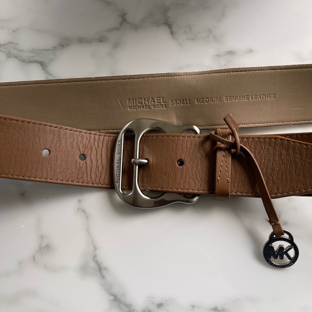Michael Kors leather belt in tan with silver hardware. Very good condition